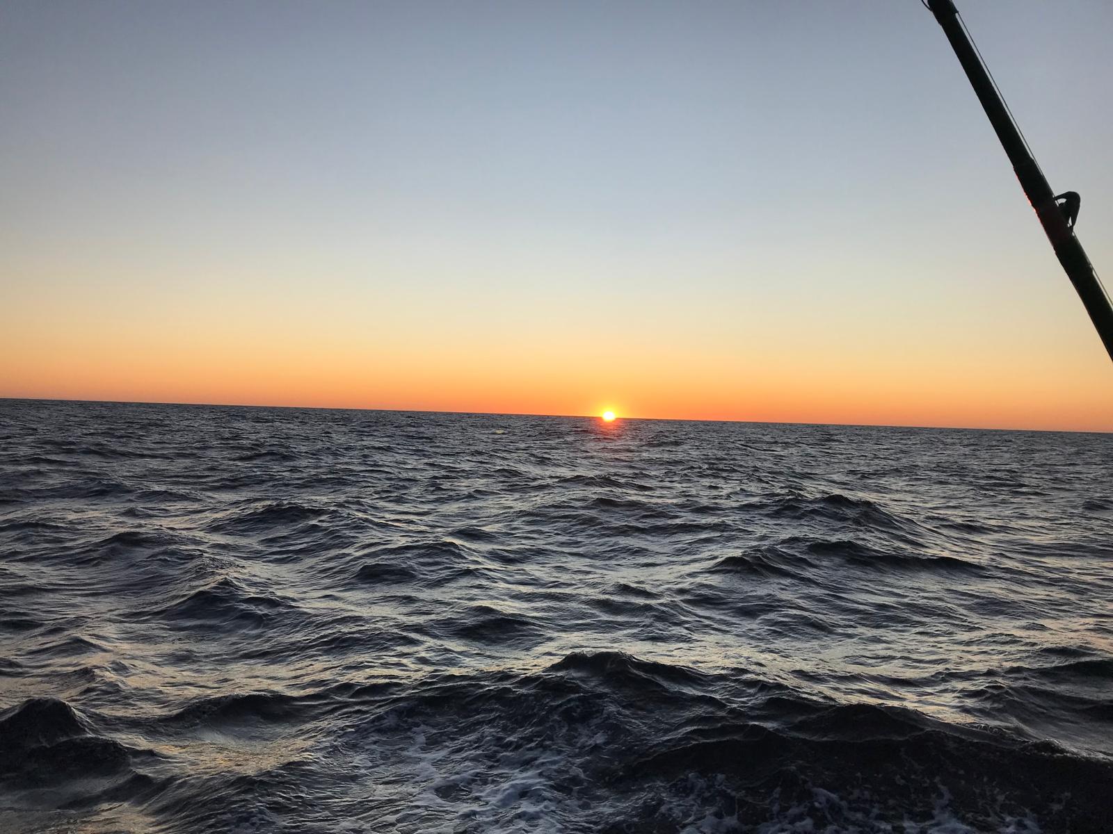 Sunset from the quarter, trolling line out.