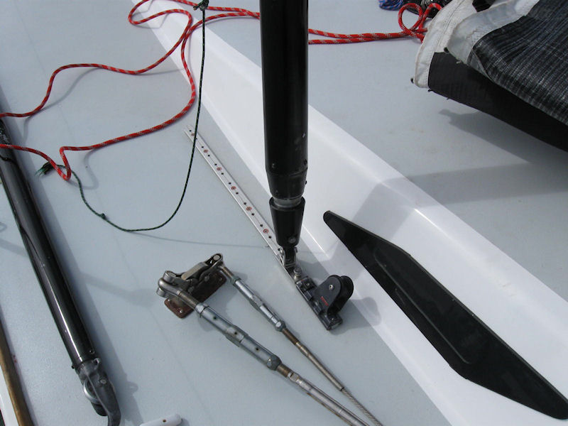 Spinnaker pole bell, brace block and pole car