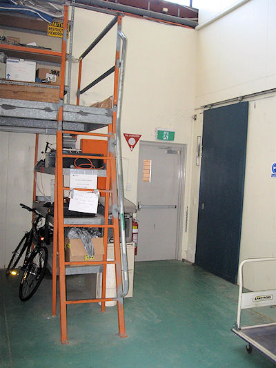 The old step ladder to the storage room — unsafe to use.